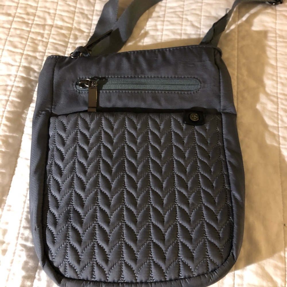 Sherpani crossbody purse.